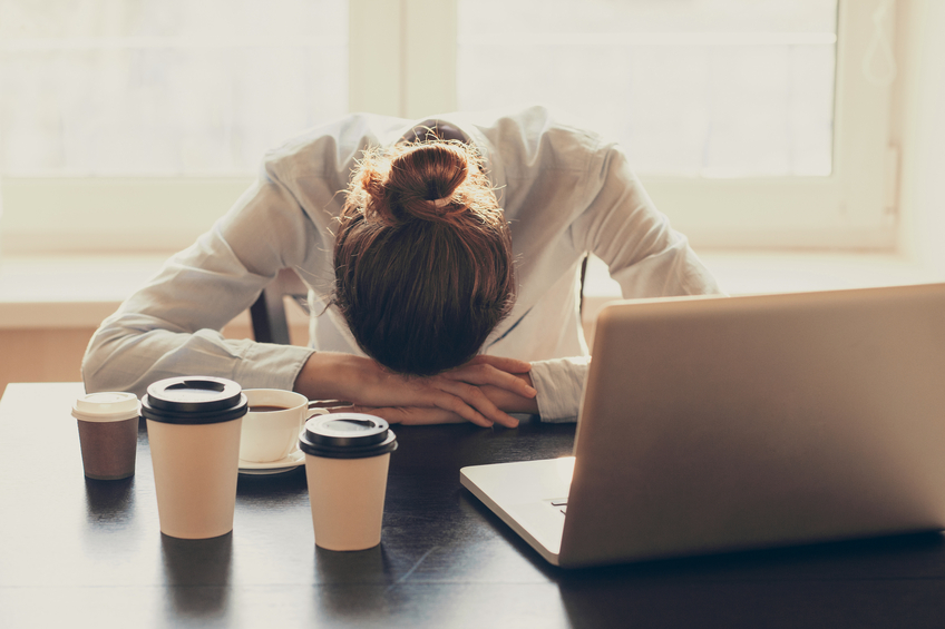 man struggling to stay awake