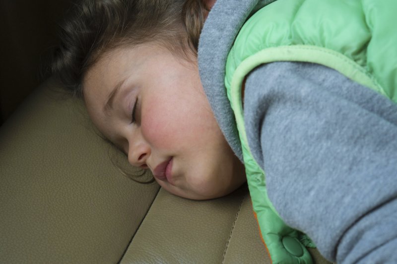 child sleeping face down